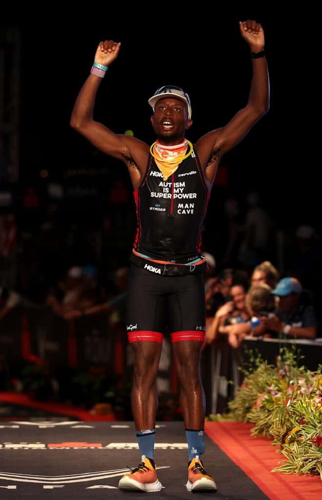 Sam Holness, of Great Britain, celebrates after finishing the Ironman World Championships on October 06, 2022 in Kailua Kona, Hawaii. Credit: Ezra Shaw/Getty Images for IRONMAN